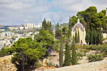 Christian chapel in the garden of cypress trees. Mount of Olives in East Jerusalem, Israel