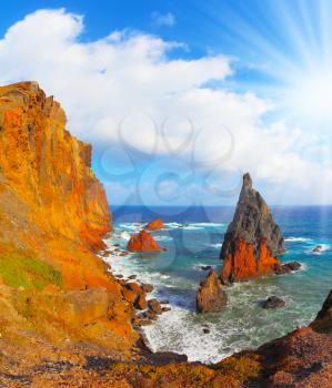 Arid eastern tip of the island of Madeira. Atlantic storms.  Colorful pinnacles lit sunset