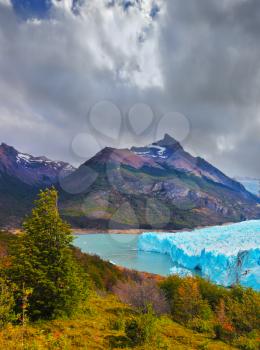 Sunny summer day in February. Los Glaciares National Park in Patagonia. Colossal Perito Moreno glacier in Lake Argentino