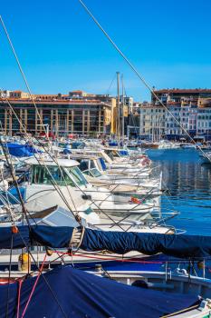  The water area of Marseille Old Port. Rows of sailing yachts, motor boats and fishing boats