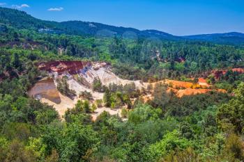 Languedoc - Roussillon, France. The pit on production ochre. Orange picturesque hills