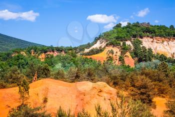 Languedoc - Roussillon, Provence, France. Reserve - quarry for ocher mining. Orange and red picturesque hills