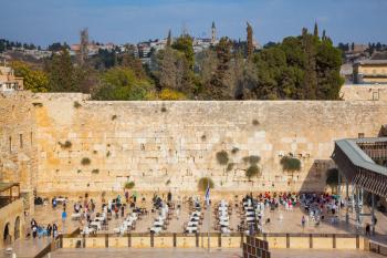 Autumn holiday Sukkot. The greatest shrine of Judaism. The Western Wall of the Temple is preparing for evening prayer