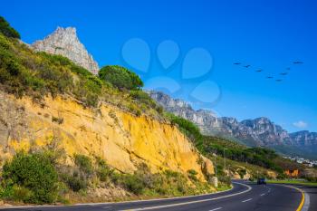 Scenic highway on the Cape of Good Hope in the Atlantic. Travel to South Africa. The concept of active tourism 