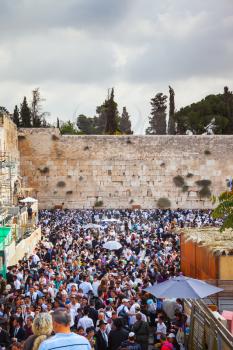 Autumn holiday of Sukkot in Jerusalem. The Western Wall of the Temple. At Temple Square was a huge crowd of Jews