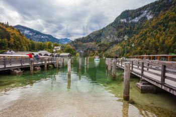  Famous lake Konigssee. Mooring for tourist pleasure boats.  Berchtesgaden in Germany on the border with Austria