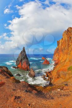 Eastern tip of the island of Madeira in the Atlantic Ocean. Pinnacles covered sunset
