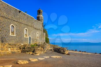 Sea of Galilee in Israel. The Church of the Primacy - Tabgha. The Holy Church was built on the Sea Gennesaret. Jesus then fed with bread and fish hungry people