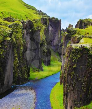 The most picturesque canyon Fjadrargljufur and river flowing along the bottom of the canyon. Fantastic country Iceland