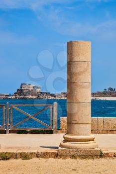 Ancient column from the Byzantine period on Mediterranean coast. National Park Caesarea, Israel