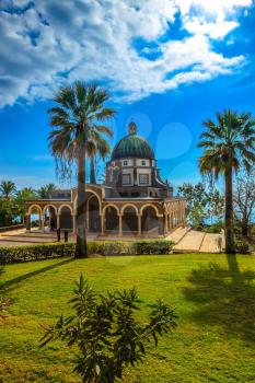 Church Sermon on the Mount - Mount of Beatitudes. The majestic dome of the basilica is surrounded by a gallery with columns. Sea of Galilee, Israel