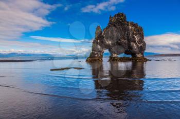 Hvitserkur picturesque rock during low tide at sunset. Stone mammoth Iceland