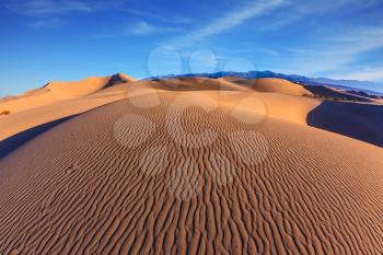 Bright sunny morning in a picturesque part of Death Valley. Thin waves on the sand. Mesquite Flat Sand Dunes