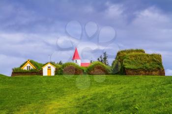 The village ancestors. The reconstituted village early settlers in Iceland. Roofs of houses covered with turf and grass