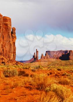  The unique red sandstone buttes mitts. Magic view of the red desert. Monument Valley in the Navajo Indian Reservation. Arizona, USA