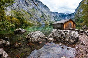  Boat garage in middle of the lake. Enchanted Lake Obersee in the Bavarian Alps. The concept of active tourism and ecotourism