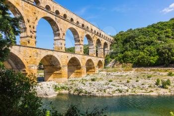 The famous aqueduct from Roman times Pont du Gard. Summer in Provence, sunny day