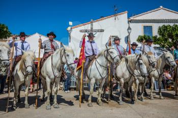 Sent-Mari-de-la-Mer, Provence, France - May 25, 2015. Square in the center of the city. World Festival of Gypsies. Guards on white horses lined up before the start of the parade