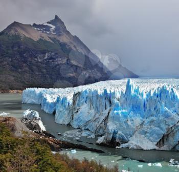 Colossal Perito Moreno glacier in Lake Argentino. Los Glaciares National Park in Argentina. Sunny summer day