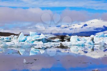 The Arctic Ocean. Iceland. Floating  ices reflected in the lagoon  Yokulsarlon 