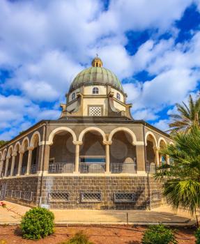 The majestic dome of the basilica is surrounded by gallery with columns. Church Sermon on the Mount - Mount of Beatitudes. Sea of Galilee, Israel
