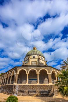 The  lake Tiberias. Basilica of the monastery of Mount Beatitudes. The magnificent dome surrounded by a colonnade