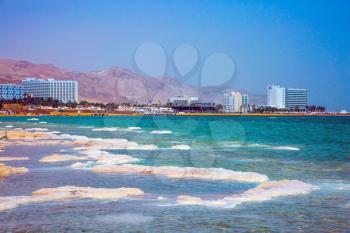 Israel, spring. Picturesque islands of medicinal salt in the lake. Forever Living Dead Sea. The concept of ecological and medical tourism