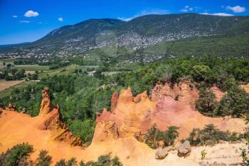  The pit on production ochre. Languedoc - Roussillon, Provence, France. Orange picturesque hills