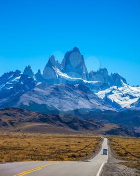Argentine Patagonia. Sunny day in February. Fine concrete highway to the majestic Mount Fitz Roy
