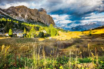 Travel in the Dolomites, pass Faltsarego. The last fine days of autumn. The concept of active and extreme tourism