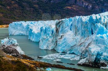  The concept of exotic and extreme tourism. The amazing glacier Perito Moreno, in the Patagonia. Argentine Province of Santa Cruz, lake Argentine