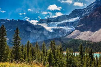 Canada, Alberta, Banff National Park. The famous Glacier Crowfoot over Bow River