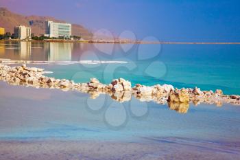 The Dead Sea resort in Israel. Turquoise smooth water and midday heat. The concept of medical and ecological tourism
