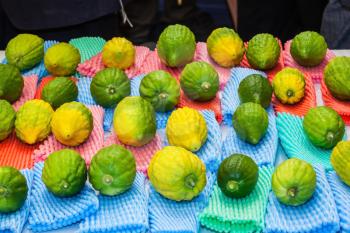 The pre-market on Sukkot.  Autumn Jewish holiday in Jerusalem. Funeral citron fruit - Etrog laid out for sale