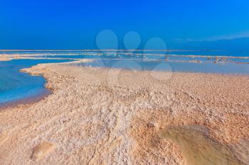  The evaporated salt acts over a water surface beautiful patterns. Decrease in water level in the Dead Sea