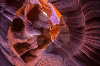 Arizona, USA. Mysterious purple - red tunnel and blue sky. Fantastic slot canyon Antelope in the Navajo reservation