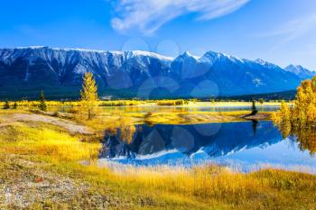 Abraham Lake is the most beautiful lake in the Rockies of Canada. Dense forests cover the lake shores. The concept of ecological and active tourism