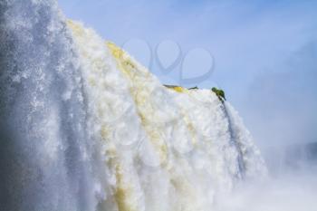 Waterfalls on the border of the Argentine and Brazilian national parks Iguazu. Concept of active and extreme tourism