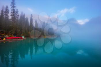 Emerald Lake in Yoho National Park. Travel to Canada. Foggy morning