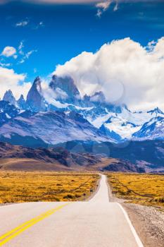  The highway crosses Patagonia and conducts to snow-covered top of Mount Fitzroy. The road through the desert
