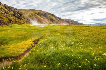 Sunrise Park Landmannalaugar.  Hot water on the source of thermal water. White nights in Iceland