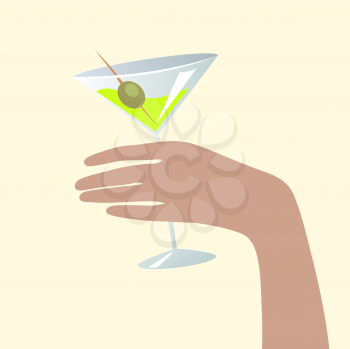 hand holding a martini glass