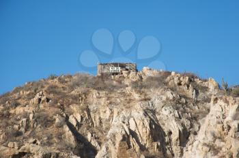 Royalty Free Photo of a Cliff Side House