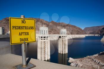 Royalty Free Photo of the Hoover Dam and a No Pedestrian Sign