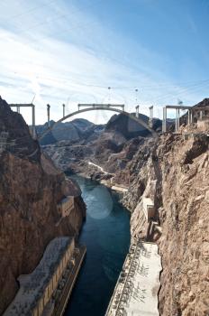 Royalty Free Photo of the Hoover Dam and the Hoover Dam Bypass Bridge During Construction