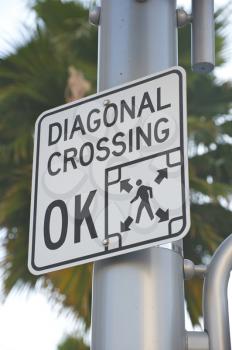 Royalty Free Photo of a Diagonal Crossing Sign