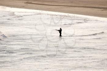 Royalty Free Photo of a Lone Angler