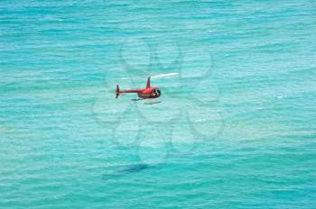 Helicopter over the ocean