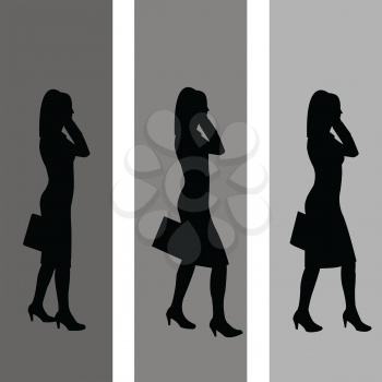 Silhouette of business women walking