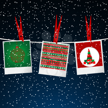 Royalty Free Clipart Image of Christmas Cards Hanging on a Line